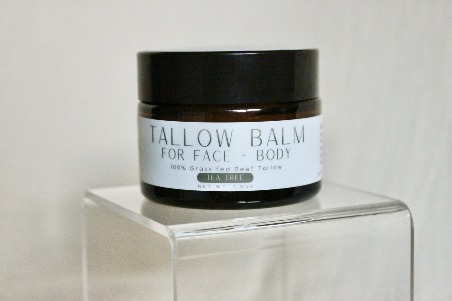 100% Grass-fed Beef Tallow Face + Body Balm containing organic jojoba oil and tea tree essential oil