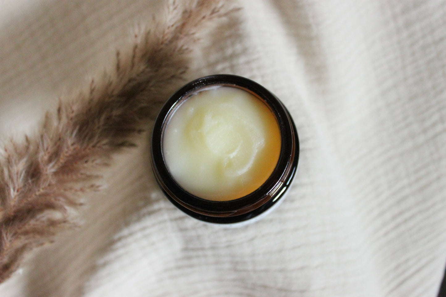 100% Grass-fed Beef Tallow Face + Body Balm containing organic jojoba oil and tea tree essential oil